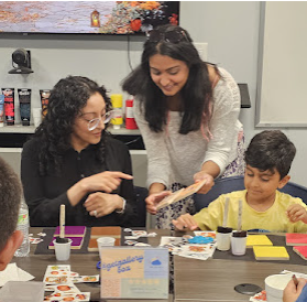 Ami guiding participants through a creative project
